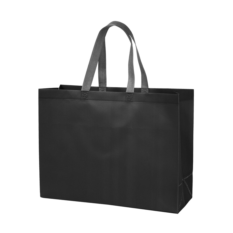 TX-222, Bolsa fabricada en tela non-woven laminado con asas superiores en color gris. El non-woven es un material duradero y de alta calidad que proporciona una barrera efectiva contra la humedad y otros elementos externos. 