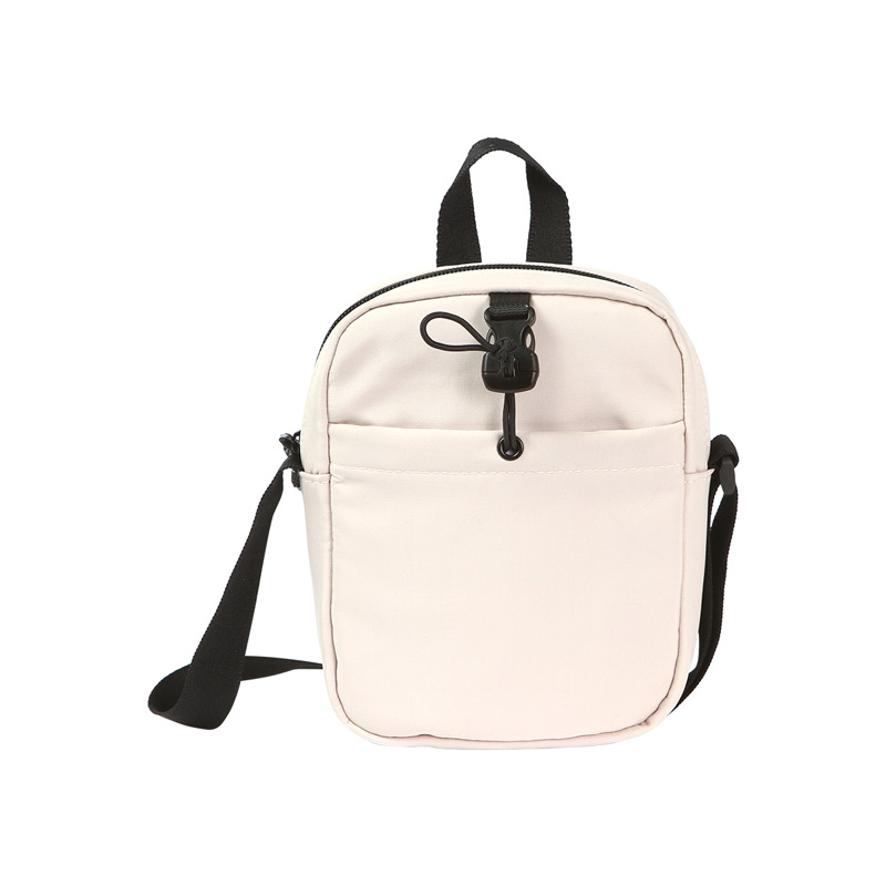 TX-291, Bolsa Roselle. Bolsa de hombro para celular, cámara y otros artículos, su diseño compacto y correa hacen de ella de fácil transportación. Cuenta con una bolsa pequeña al frente y cierre en la bolsa principal.